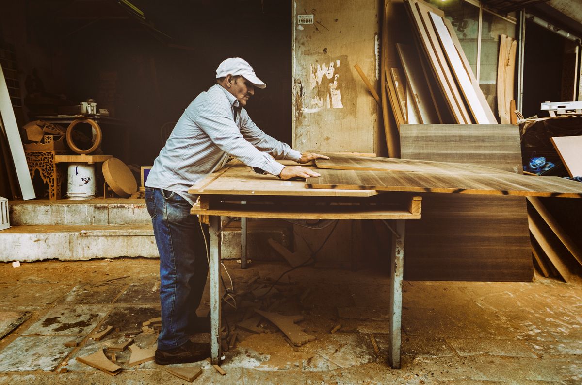 Carpenter at workbench — craftsmanship and attention to detail